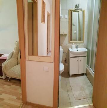 Фото номера Апартаменты с 2 спальнями Апартаменты Taikos 24-7a г. Нида 21