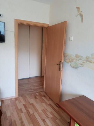 Фото номера Апартаменты с 2 спальнями Апартаменты Taikos 24-7a г. Нида 63