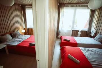 Фото номера Четырехместный номер с балконом Гостевой дом Hostel El Nido г. Нида 4