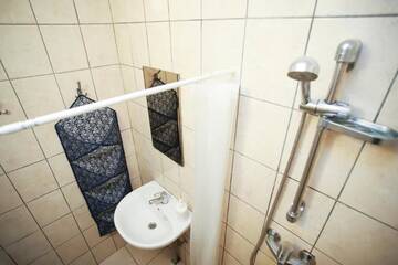 Фото номера Двухместный номер с 1 кроватью и общим туалетом Гостевой дом Hostel El Nido г. Нида 5