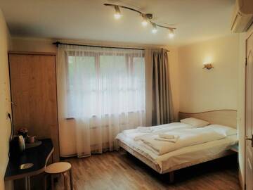 Фото номера Двухместный номер с 1 кроватью, вид на сад Гостевой дом K8-5 Apartments г. Нида 7