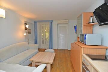 Фото номера Апартаменты с 1 спальней Апартаменты Apartamentai Kopos г. Нида 3