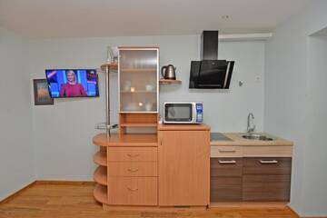 Фото номера Апартаменты с 1 спальней Апартаменты Apartamentai Kopos г. Нида 4