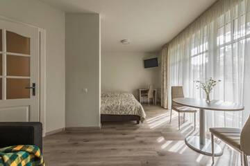 Фото номера Апартаменты с 2 односпальными кроватями Отель ORO Nida г. Нида 14