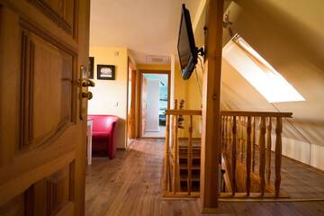 Фото номера Апартаменты с 2 спальнями в мансарде Апартаменты Apartamentai Ramybė г. Нида 21