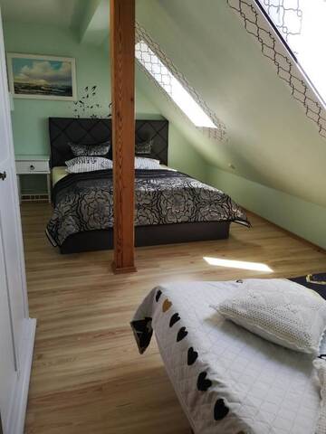 Фото номера Апартаменты с 2 спальнями в мансарде Апартаменты Apartamentai Ramybė г. Нида 61